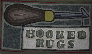 Hooked Rug Sign